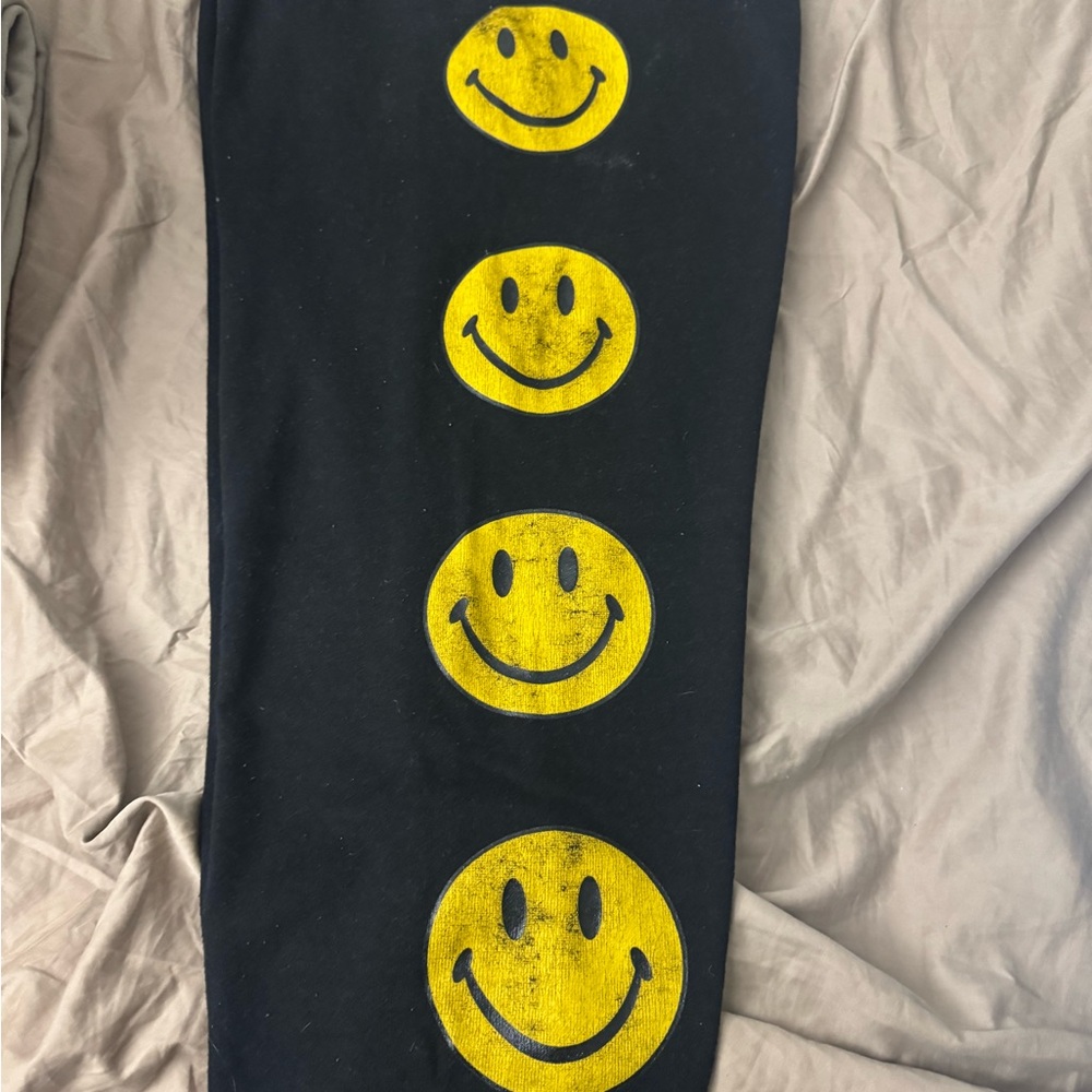Aviator Nation with the yellow Smiley Faces sweatpants